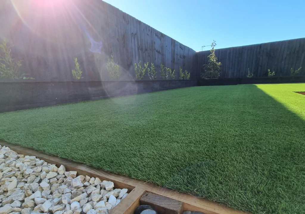 how to clean artificial grass bushing
